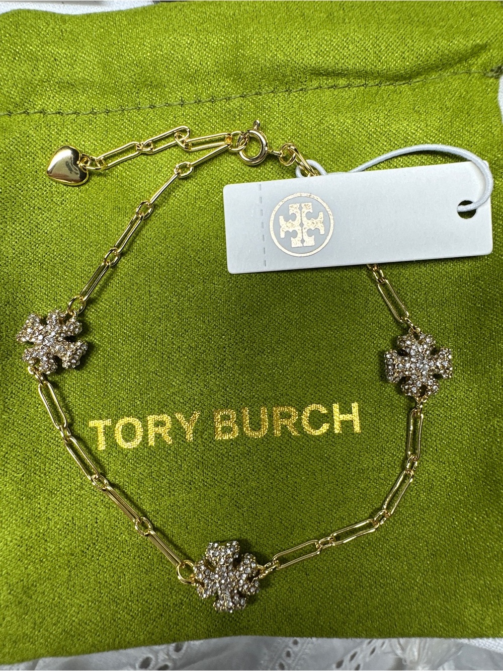 Tory Burch Gold Crystal Floral Link Bracelet with Heart Charm